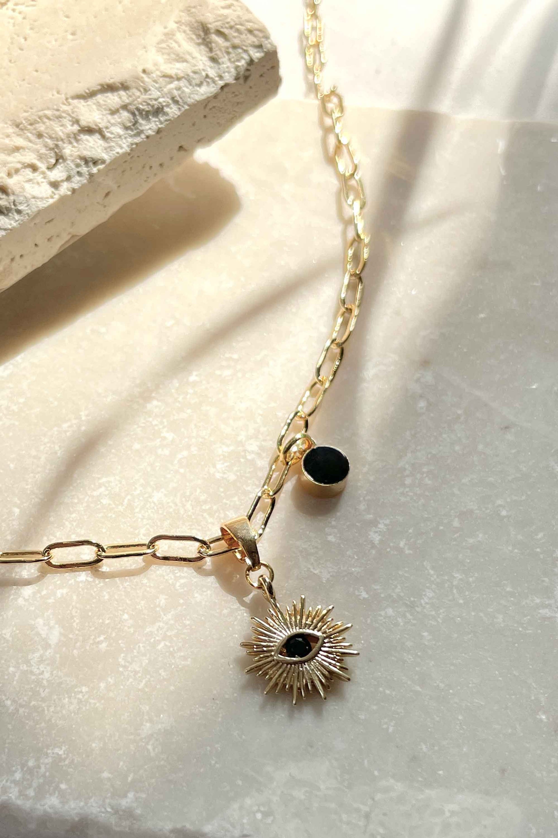 black-onyx-stone-celestial-star-pendant-gold-chain-necklace